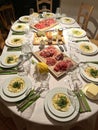 Waiting for the guests - a well prepared table with ham, sausages, cheese and Cedri with rucola as firts course