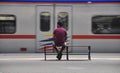 Waiting for his train to come