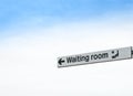 Waiting Room Sign Isolated against Sky Background Royalty Free Stock Photo