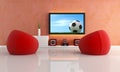 Waiting for soccer game in a modern living room Royalty Free Stock Photo