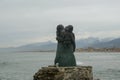 The Waiting Statue or LâAttesa e Scoglio in the harbor in Viareggio, Tuscany, Italy