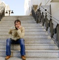 Waiting on the steps Royalty Free Stock Photo