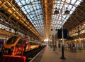 Waiting to board a fast Virgin train between London and Manchester at Waterloo station