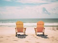 Waiting for tourists. Empty sun loungers stand under a canopy on the beach Royalty Free Stock Photo