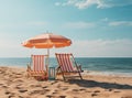 Waiting for tourists. Empty sun loungers stand under a canopy on the beach Royalty Free Stock Photo