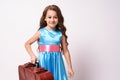 Waiting for trip. Large suitcase. Little cute girl Royalty Free Stock Photo