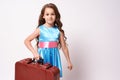 Waiting for trip. Little cute girl. Large suitcase Royalty Free Stock Photo