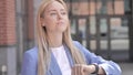 Waiting Young Businesswoman Checking Time on Watch Royalty Free Stock Photo