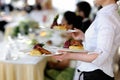 Waitress is carrying three plates Royalty Free Stock Photo