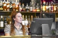 The waitress at the cash register Royalty Free Stock Photo