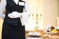 Waitress at catering service in restaurant