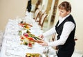 Waitress at catering work in a restaurant Royalty Free Stock Photo