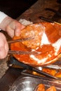 Waitress Cleaning around food buffet