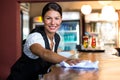 Waitress cleaning the counter