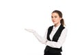 Waitress in formal wear and white gloves pointing with hand isolated on white