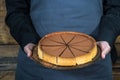 Waitress holding chocolate tort