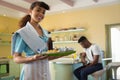 Waitress holding a tray of breakfast Royalty Free Stock Photo