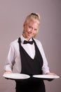 Waitress holding two plates