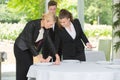 Waitress with manager setting table in restaurant Royalty Free Stock Photo