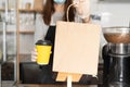 A waitress in a medical mask