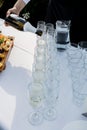 Waitress pouring champagne