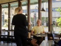 Waitress serves customer