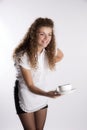 Waitress serving a cup of tea Royalty Free Stock Photo