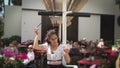 Waitress serving and pouring Sherry, a traditional habit called Venenciar in Malaga, Spain Royalty Free Stock Photo