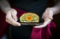 waitress serving traditional chinese festive mooncake pastry dessert