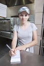 Waitress taking order in a fast food restaurant Royalty Free Stock Photo