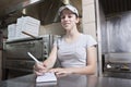 Waitress taking order in a fast food restaurant