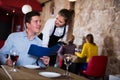 Waitress taking order in restaurant Royalty Free Stock Photo