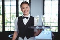 Waitress with a tray of flute of champagne