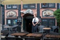 Waitress waiting in Nyhavn, Copenhagen