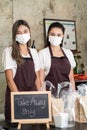 Waitress wear protective face mask with take away food