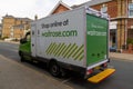 A waitrose grocery home delivery lorry parked at the side of a street