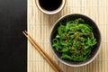 Wakame seaweed salad with sesame and chili pepper Royalty Free Stock Photo