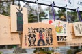 Traditional wooden prayer tablet Ema at Kumano Hongu Taisha in Tanabe, Wakayama, Japan