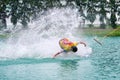 Wake boarding rider sliding and jumping trick with water splash. Royalty Free Stock Photo