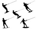 Wake boarding silhouettes Royalty Free Stock Photo
