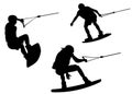 Wake boarding silhouettes Royalty Free Stock Photo