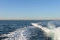 wake of the boat on the surface of the sea on a summer day Royalty Free Stock Photo