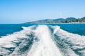 Wake of boat on water surface Royalty Free Stock Photo