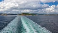 Wake of a cruise ship on the open ocean Royalty Free Stock Photo