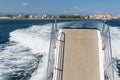 Wake and Gangway of ferry leaving harbor of Milazzo, Italy Royalty Free Stock Photo