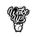 Wake up hand written lettering quote with alarm clock.