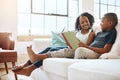 Wake up and read to keep your mind active. a little brother and sister reading a book indoors. Royalty Free Stock Photo