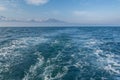 The wake was created behind the Whale Watching boat, Husavik, Iceland Royalty Free Stock Photo