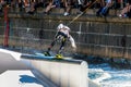 Wakeboard freestyle rider does tricks at competition