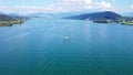 Wakeboard and Motorboat Lake Zurich, Switzerland. Watersport and drone aerial shot from behind